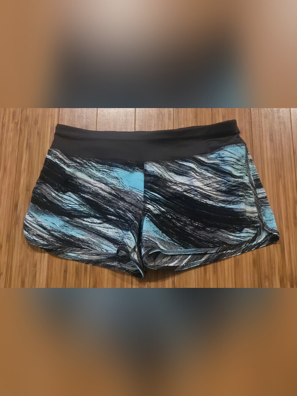 Ideology Women’s Athletic Shorts in Black and Light Blue Wave Print